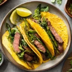 Grilled Onion Skirt Steak Tacos